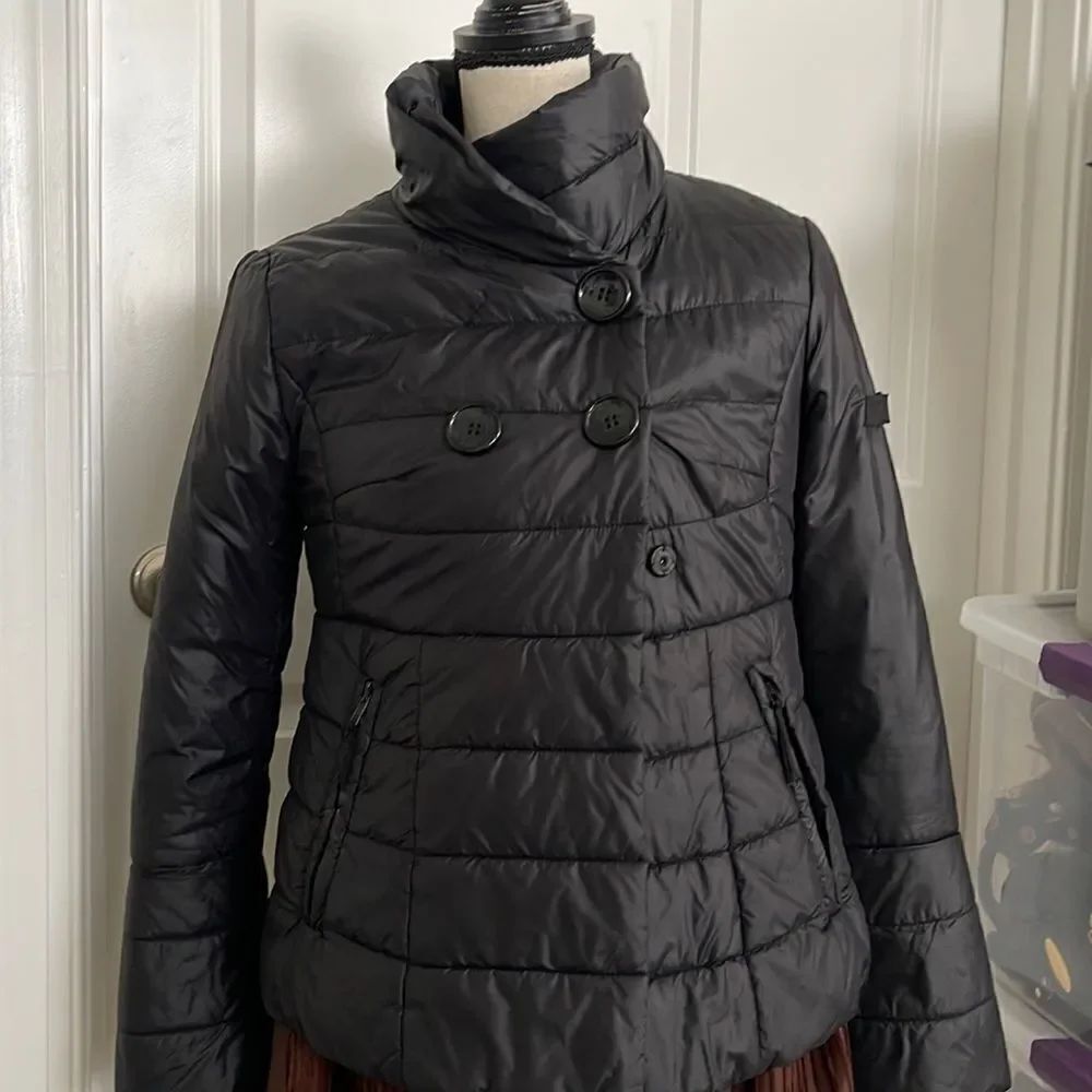 Adorable Sundance puffer coat with fun bell sleeve.